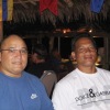 Tarkong (left) seated with Nakbae Kitiseni, President of Tuvalu Wrestling Federation (right) at Oceania Athletes Committee Dinner in Vanuatu